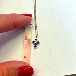 Sapphire and diamond cross pendant with white gold chain